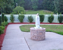 A statue of Mary in the garden